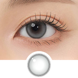 Close-up shot of model's eye adorned with Gemhour Themis Sage Grey daily color contact lenses with prescription, complemented by clean eye makeup, showing the brightening and enlarging effect of the circle contact lens on dark brown eyes, above a cutout of the contact lens pattern with limbal ring on a white background.