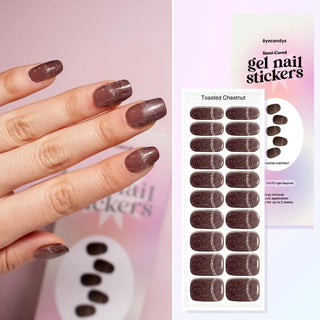 Hand featuring EyeCandys toasted chestnut gel nail stickers, with a film displaying the design. Ideal for effortless, trendy nail art with durable, vibrant patterns and a professional finish for at-home manicures