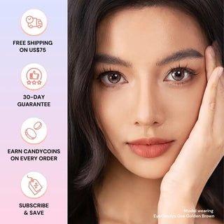 Full face of model wearing EyeCandys Doe Golden Brown colored contact lenses. Close-up highlighting warm honey-brown iris, natural enhancement, long lashes, and soft limbal ring for a radiant, wide-eyed look.