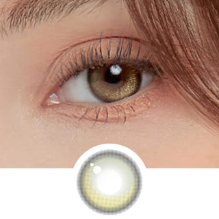 Close-up view of model's eye with Winkly Green contact lens paired with peach eyeshadow and a cut-out of the same lens below