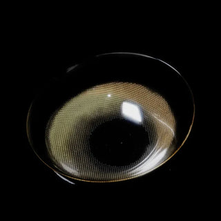 Macro photo of EyeCandys Amelie brown prescription colored contact lenses showcasing the thin material and cosmetic lens design