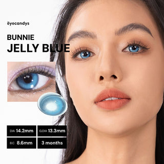 Close-up of model’s face wearing EyeCandys Bunnie Jelly Blue colored prescription contact lens, highlighting vibrant jelly blue eyes.