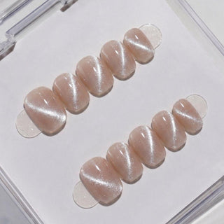 EyeCandys Business Casual press on nails featuring dusty grey taupe nails with fine silver micro glitter shimmer and glossy finish in a short round shape.