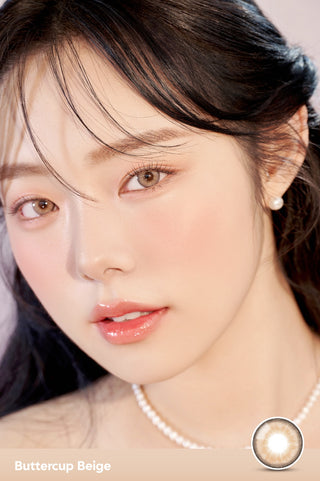 A close-up of a model demonstrating a natural makeup look with Ann365 Buttercup Beige circle colour contacts, highlighting how well the contact lenses blend with her dark eyes.