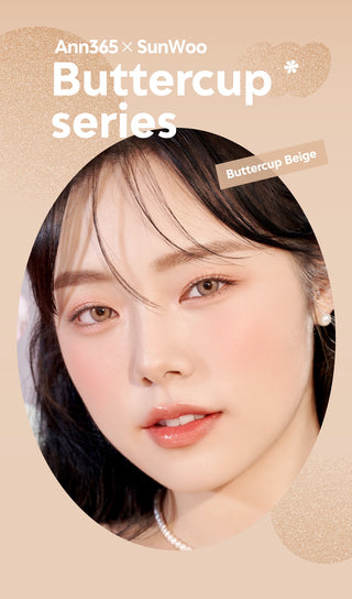 A close-up of a model demonstrating a natural makeup look with Ann365 Buttercup 1-Day Beige (10pk) circle colour contacts, highlighting how well the contact lenses blend with her dark eyes.