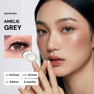 Model with natural makeup wearing EyeCandys Amelie Earl Grey prescription coloured contacts, close-up of eyes, soft and subtle grey tones, enhancing natural look