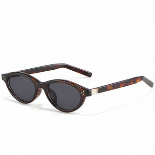 Eyecandys Loretta Tortoiseshell sunglasses featuring a classic oval full-frame design, warm tortoiseshell pattern, and a polished vintage-inspired style.