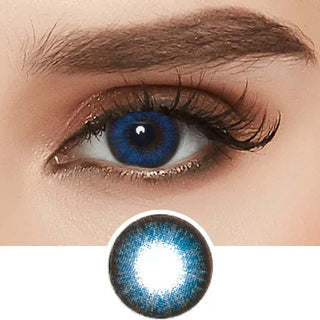 A close-up of an eye with long lashes and a defined eyebrow wearing NEO Vision Extra Dali Blue contacts, with an enlarged image of the NEO Vision lens design displayed below, highlighting the vibrant circle lenses.