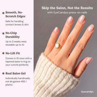 Detailed view of Eyecandys Silk Slip press-on nails highlighting a reflective champagne pink chrome finish, pearlescent glow, and glossy glazed manicure.