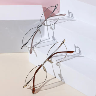 Eyecandys Zephyr Unisex Oval Full Frame Glasses in Titanium for a sleek, durable design with lightweight comfort. Ideal for both men and women looking for a stylish, modern look