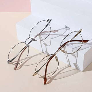 Eyecandys Zephyr Unisex Oval Glasses in Full Titanium Frame, designed for both men and women with a durable, lightweight construction and a timeless oval shape for everyday wear.