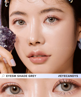 Eyesm Shade Grey Colour Contact Lens worn on a female model with dark eyes