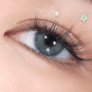 Close-up video of blinking eye with long lashes wearing EyeCandys Pink Label Amalfi Blue – bright blue prescription colored contact lenses. Natural-looking color contact lenses for daily comfort and vibrant eyes.