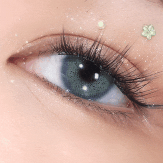 Close-up video of blinking eye with long lashes wearing EyeCandys Pink Label Amalfi Blue – bright blue prescription colored contact lenses. Natural-looking color contact lenses for daily comfort and vibrant eyes.