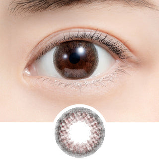 Close-up shot of model's eye adorned with Feliamo 1-Day Cafe Mocha (10pk) daily color contact lenses with prescription, paired with clean-girl eye makeup, showing the brightening and enlarging effect of the circle contact lens on dark brown eyes, above a cutout of the contact lens with limbal ring on a white background.