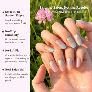 Stylish hand wearing First Light press on nails featuring soft aurora gradient nails with glowing iridescent shimmer effect.