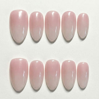 Short almond press on nails EyeCandys Glazed Donut with sheer pink gradient, milky white tips, and high gloss glazed finish.