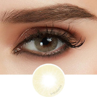 Composite of a dark iris wearing the Glossy Ivory color contact lens, above the design file of the contact lens itself.