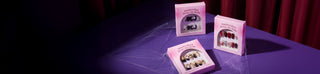 EyeCandys Halloween Press-On Nails packaging showcasing assorted spooky, gothic, and Halloween-inspired nail designs