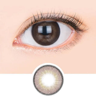 Macro shot of an eye wearing the i-Sha Jadey Gem Choco prescription colour contact lens, showing the multi-colored detail and natural effect on dark brown eyes, with clean eye makeup. At the bottom is the pattern of the colored lens design, showing the dotted detail and pigmentation.