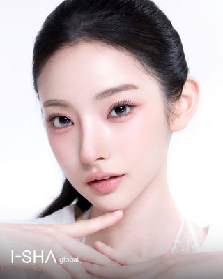Beauty portrait of a woman wearing gray contact lenses, with a clean makeup.