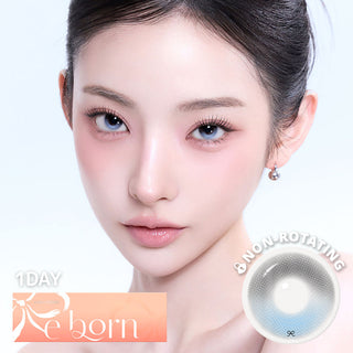 Beauty Portrait featuring blue-gray contact lenses, soft pink makeup, sleep pulled-back hair, with a matching contact lens product and elegant peach-toned.