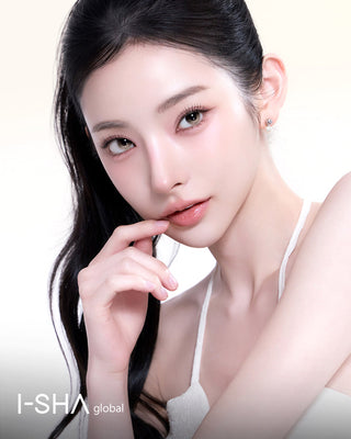 Beauty portrait of a woman wearing gray-latte contact lenses with soft makeup.