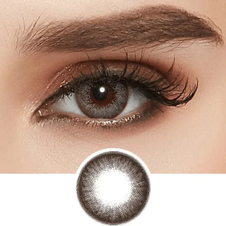A close-up shows an eye with long lashes, brown eyeshadow, and the NEO Vision Extra Dali Grey contact lens by NEO Vision; below is a separate image of this grey circle lens.