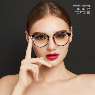 model with simple everyday make up look wearing Infinity Oversized Oval in tortoise color