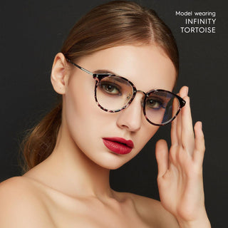 model with simple everyday make up look wearing Infinity Oversized Oval in tortoise color