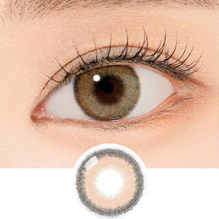 Close-up shot of a model's eye wearing Lensrang Comely Brown color contacts with prescription, paired with K-beauty-inspired eye makeup, showing the brightening and enlarging effect of the circle contact lens on dark brown eyes, above a cutout of the contact lens pattern with limbal ring on a white background.