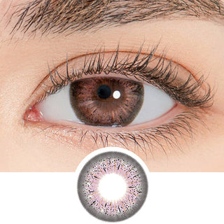 Close-up shot of a model's eye wearing Lensrang Puella Pink Brown color contacts with prescription, paired with K-beauty-inspired eye makeup, showing the brightening and enlarging effect of the circle contact lens on dark brown eyes, above a cutout of the contact lens pattern with limbal ring on a white background.