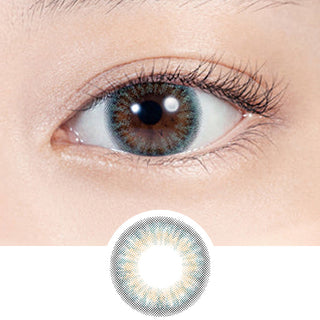 Close-up shot of model's eye adorned with Lilmoon Monthly Ocean (Non Prescription) color contact lenses prescription, paired with clean-girl eye makeup, showing the brightening and enlarging effect of the circle contact lens on dark brown eyes, above a cutout of the contact lens with limbal ring on a white background.