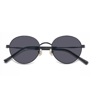 Elegant black Luna Round reading glasses with a narrow fit, featuring a straight black tint. These lightweight, durable frames are perfect for adding a touch of sophistication to any look, offering both style and comfort for daily use.