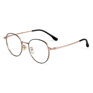 Side view of Round vintage glasses frames in black and gold on a white background