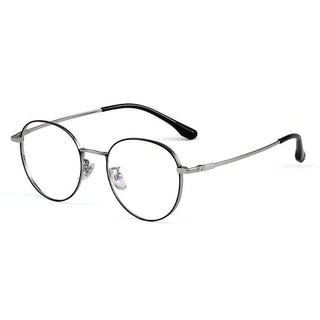 Side view of  Round vintage glasses frames in black and silver on a white background