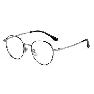 Side view of Round vintage glasses frames in black and silver on a white background