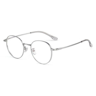 Side view of Round vintage glasses frames in silver on a white background