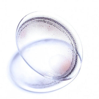 Macro shot of EyeCandys Olola Meow Devon Beige colored contact lens, showcasing intricate lens pattern and warm beige color.