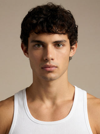 Close-up of male model’s eyes with EyeCandys Cashmere Satin Olive colored contacts, realistic olive prescription lenses