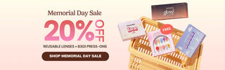 Memorial Day Sale homepage banner featuring 20% off reusable contact lenses and Buy 3 Get 1 free press-on nails from EyeCandys, with pastel product boxes and shopping basket on a soft pink background.