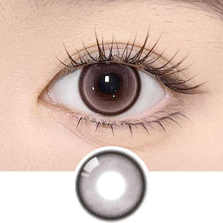 Olala Meow Angora Pink color contact lens on top of a dark eye paired with subtle eye makeup and curled wispy eyelashes, above the contact lens design.