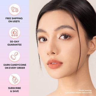 Model with natural makeup wearing EyeCandys Amelie Sakura Pink Jelly prescription colored contact lens, highlighting soft pink eye tones.