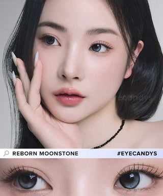 A female model with natural dark eyes wearing i-Sha Reborn Moon Stone contact lenses, complemented by subtle eyeshadow and peach lipstick and Close-up image showcases the model's eyes adorned with the same grey contact lenses