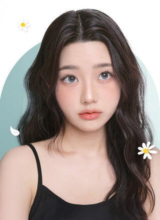 Girl with long lashes wearing EyeCandys One Pick Becca Green Prescription Colored Contact Lenses – vibrant, natural green eye enhancement with all-day comfort