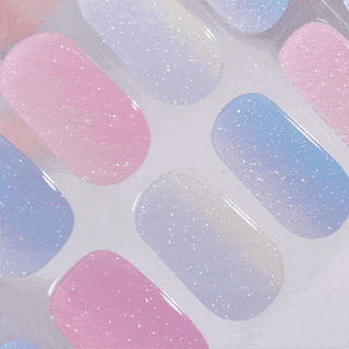 EyeCandys gel nail stickers displayed on film, showcasing vibrant, long-lasting designs for easy at-home manicures. Perfect for effortless, salon-quality nails with durable wear and a glossy finish