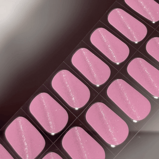 EyeCandys Pilates Princess Gel nail sticker featuring a soft, pastel pink shade with subtle shimmer. This semi-cured gel set channels clean-girl energy with a playful yet polished look—perfect for everyday elegance and effortless nail styling.