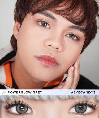 Model wearing EyeCandys Powerglow Grey contact lenses — ultra-vibrant grey tone with full-coverage color ideal for cosplay. Close-up of eyes with long lashes highlights the lens’s defined limbal ring, UV protection, and moisture-retaining MPC polymer for all-day comfort and striking eye definition