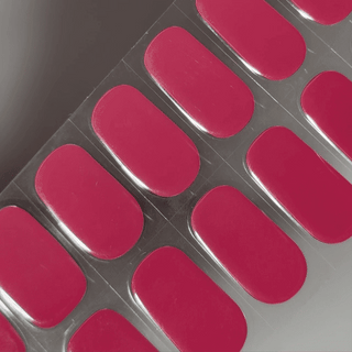 EyeCandys Raspberry Milk Gel nail sticker featuring a rich, creamy raspberry pink hue with a smooth, glossy finish. This semi-cured gel set delivers a vibrant, berry-toned manicure—perfect for playful, chic looks with effortless, long-lasting wear.