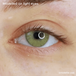 close up eye wearing Dare to be Hazel contact lenses on top of a light color iris.